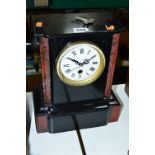 A SLATE MANTEL CLOCK, with Roman numerals, converted to battery but with works still inside,