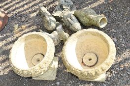 TWO COMPOSITE GARDEN URNS and six garden ornaments (8)