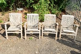 FOUR HARDWOOD GARDEN ARM CHAIRS, with slatted seat and back