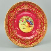 A ROYAL DOULTON CABINET PLATE, with roundel of fruit and signed T Price on maroon and gilt ground,