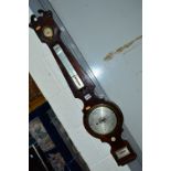 A GEORGIAN FLAME MAHOGANY BANJO BAROMETER, signed A M Ortelli Godalming (sd)