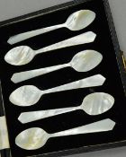 A BOXED SET OF SIX MOTHER OF PEARL TEASPOONS