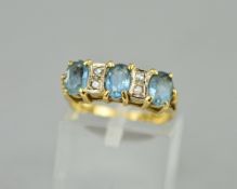 AN 18CT DIAMOND AND BLUE STONE RING, ring size J, approximate weight 4.3 grams