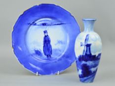A DOULTON BURSLEM BLUE AND WHITE VASE, depicting windmill in landscape setting, brown factory