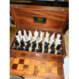 A LIMITED EDITION HERALD CHESS SET, designed for Oxley Crafts, Burton on Trent, No 46/500, with