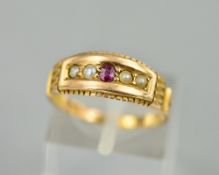 A 15CT EDWARDIAN RING SET WITH SEED PEARLS AND A RUBY, ring size M, approximate weight 3.1 grams