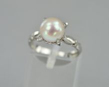 A LATE 20TH CENTURY SINGLE STONE CULTURED PEARL RING, one Akoya cultured pearl measuring