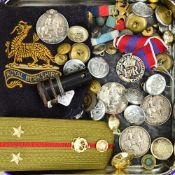 A BOX OF MILITARY ITEMS, to include four WWI war medals (a/f)