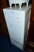 A VINTAGE PAINTED WOODEN FOUR DRAWER FILING CABINET