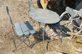A MODERN METAL GARDEN TABLE, and two chairs (3)
