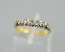 AN 18CT 1930'S FIVE STONE DIAMOND RING, ring size O, approximate weight 3.7 grams