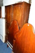 AN EDWARDIAN MAHOGANY TWO DOOR WARDROBE (cornice inside and apart) and two solid mahogany 3ft bed