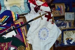 A LARGE COLLECTION OF MASONIC ITEMS, including aprons, badges, capes, sword (Spencer & Co, London)