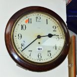 AN ENFIELD WALL CLOCK, the circular dial set with Arabic numerals, total diameter approximately 39cm