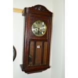 A 20TH CENTURY OAK WALL CLOCK