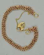 A MID TO LATE 20TH CENTURY 9CT GOLD CURB LINK BRACELET WITH HEART DETAIL DECORATION, together with