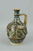 A DOULTON LAMBETH STONEWARE JUG BY FRANK BUTLER, brown mottled ground with scrolling foliage and
