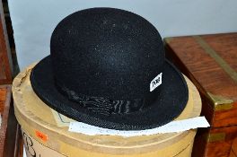 A CHRISTY'S LONDON BOWLER HAT, made expressly for Ellis & Son of Burton on Trent and Tutbury, size