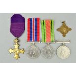 A SELECTION OF MEDALS, to include two WWII Defence medals, British WWII War medal, a St. John