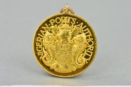 A JOHN PINCHES MEDAL, in 9K gold to Nigerian Ports authority approximately 15 grams