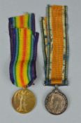 A GROUP OF WWI MEDALS, together with a period named plaque and a large glazed frame with a sepia