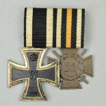 A MOUNTED PAIR OF IMPERIAL GERMAN WWI MEDALS, to include Iron Cross and Hindenberg Cross with