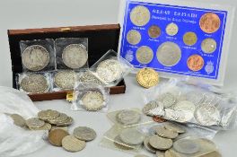 A SMALL PACKET OF MAINLY UK SILVER COINAGE, to include seven crowns, George III 1819, Victoria 1887,