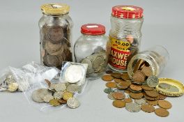 FOUR JARS AND A BAG OF UK COINS, to include over 650 grams of pre 1947 silver coins, etc