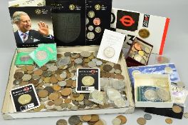 A BOX LID OF COINS AND COMMEMORATIVES, to include Royal Mint year sets, five pound coins, etc