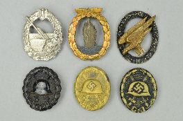 A SELECTION OF GERMAN MILITARY BADGES, to include Imperial WWI Wound badge (black grade), WWII Wound