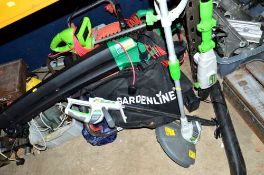 A FLYMO LAWNMOWER, a Gardenline leaf blower, a hedge trimmer and three Power King 18volt garden