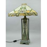 A LARGE TIFFANY STYLE TABLE LAMP, having square canopy shaped shade, central illuminated column,