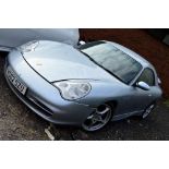 A 2002 PORSCHE 911 CARRERA 2996 CONVERTIBLE, in silver, unverified mileage shown 69547, V5C present,