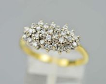AN 18CT DIAMOND CLUSTER RING, with claw set round brilliant cut diamonds on two tiers, stamped,