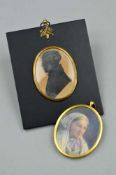 A FRAMED SILHOUETTE AND A LATE VICTORIAN MINIATURE, both of oval outline, the silhouette of a late