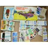 A QUANTITY OF CIGARETTE AND TRADE CARDS, loose and stuck into albums, majority are 1960's/1970's