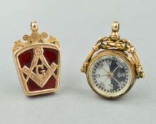 TWO EARLY 20TH CENTURY FOBS, the first with a compass to one side and bloodstone to the other,