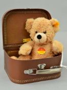 A STEIFF COSY TEDDY BEAR FYNN IN SUITCASE, No 111471, approximate height 28cm