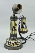 A TIFFANY STYLE NOVELTY TABLE LAMP, shaped as a candlestick telephone from Fine Light manufacturers,