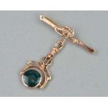 A 9CT GOLD BROOCH WITH DETACHABLE SWIVEL FOB, set with bloodstone and cornelian in a circular rub