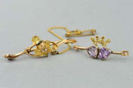 TWO EARLY 20TH CENTURY GEM BAR BROOCHES, the first designed as a thistle with faceted citrine tip,