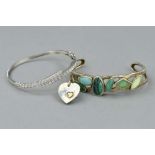 THREE ITEMS OF JEWELLERY, to include a Links of London heart charm, a green gem torque bangle and