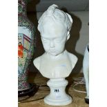 A PLASTER BUST OF A YOUNG FEMALE WITH BRAIDED HAIR, height approximately 45cm