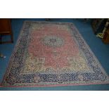 A MODERN WOOLLEN CARPET SQUARE, pink ground, multi strap border, approximate size 300cm x 201cm