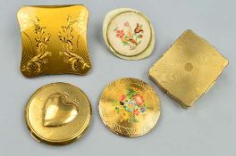 FIVE GILT COMPACTS, to include a Stratton compact with musical feature