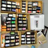 A LARGE COLLECTION OF ZIPPO LIGHTERS, most with boxes and pamphlets