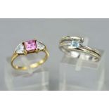 TWO 9CT GEM SET RINGS, the first a square topaz in a crossover setting, hallmarked Birmingham,