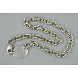 A SILVER TIFFANY & CO NECKLACE, with a link chain and engraved Tiffany plaque, stamped '925',