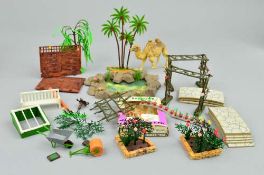 A QUANTITY OF BOXED AND UNBOXED BRITAINS FLORAL MINIATURE GARDEN ITEMS, plants and accessories,