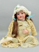 A JOHANN DANIEL KESTNER BISQUE HEAD DOLL, nape of neck marked 'Made in Germany J.D.K. 260', with